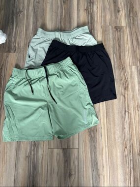 Bundle of Men's Athletic Shorts in Sage, Black, and Light Gray